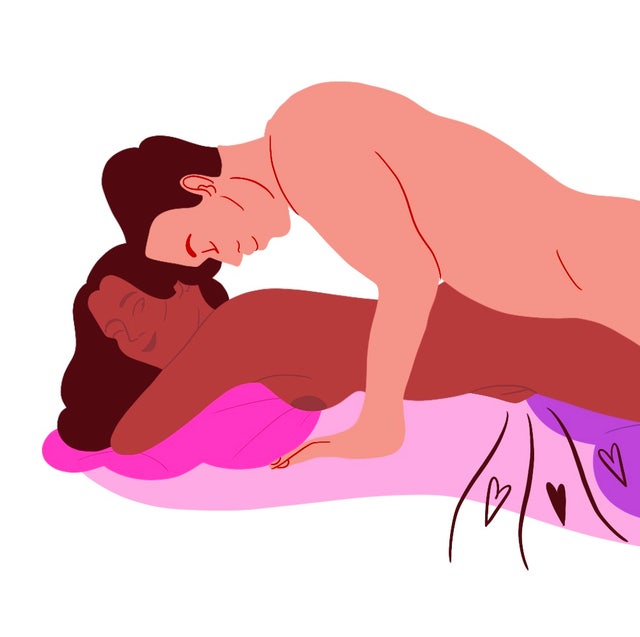 man on top of woman laying face down