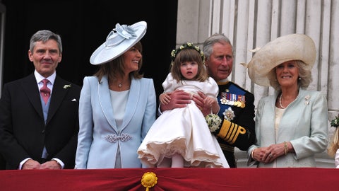 london, england   april 29  l r michael middleton, carole middleton, prince charles, prince of wales holding bridesmaid eliza lopes and the camilla, duchess of cornwall on the balcony at buckingham palace after the royal wedding of prince william to catherine middleton on april 29, 2011 in london, england the marriage of the second in line to the british throne was led by the archbishop of canterbury and was attended by 1900 guests, including foreign royal family members and heads of state thousands of well wishers from around the world have also flocked to london to witness the spectacle and pageantry of the royal wedding photo by john stillwell wpa poolgetty images