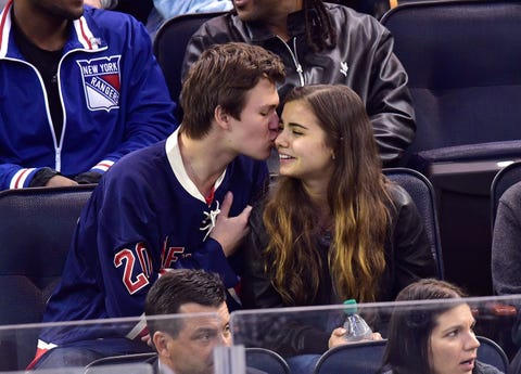 new york, ny april 16 ansel elgort and violetta komyshan attend the pittsburgh penguins vs new york rangers playoff game at madison square garden on april 16, 2015 in new york city photo by james devaneygc images