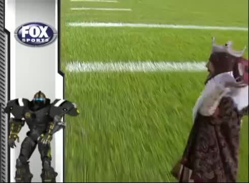 December 15, 2013: The Fox Robot makes an appearance during an NFL football  game between the Green Bay Packers and the Dallas Cowboys at AT&T Stadium  in Arlington, TX Green Bay defeated