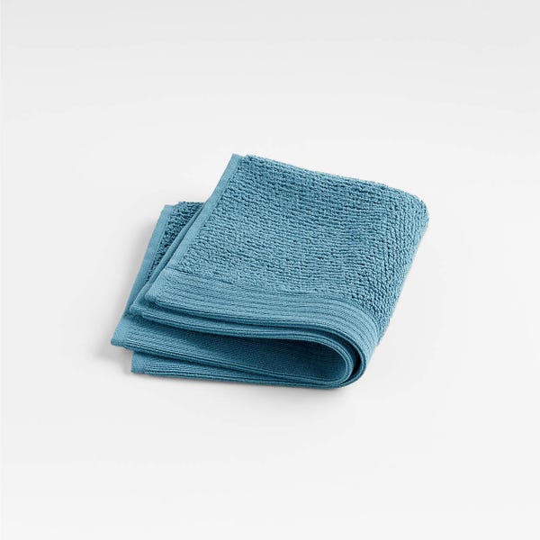 https://media.hearstapps.com/vader-prod.s3.amazonaws.com/1666023538-teal-anti-microbial-organic-cotton-washcloth.jpg?width=600