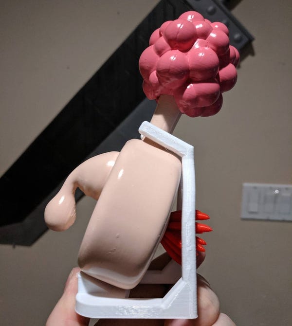 Plumbus with stand + manual